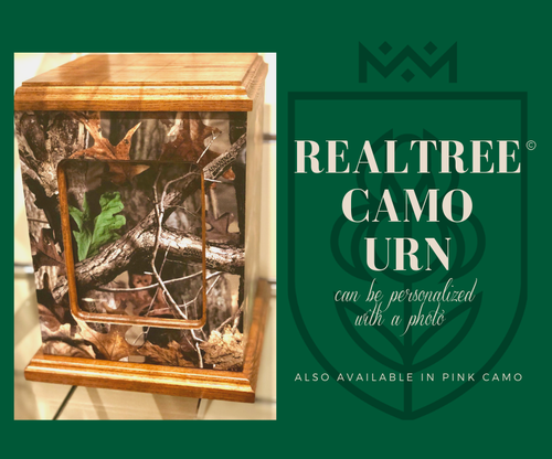 Realtree camo urn with wooden frame, green background, and promotional text for personalization and pink camo