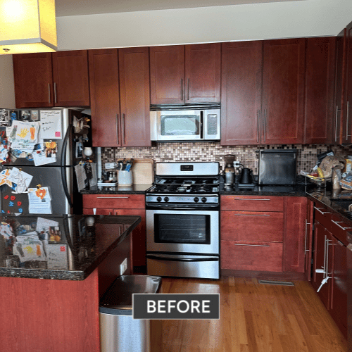 A kitchen with white cabinets , stainless steel appliances , a sink , and a stove.