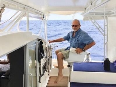 Bert sitting at the helm in the captain's seat