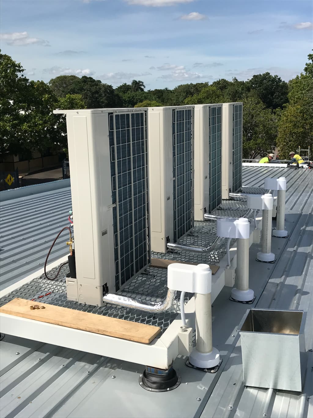 Four Large Commercial Air Conditioning Units on the Top a Warehouse— PRO COOL NT In Virginia, NT