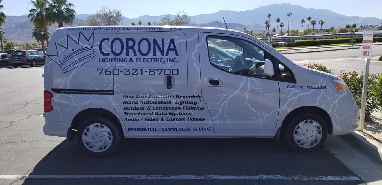 A white van with the word corona on it is parked in a parking lot.