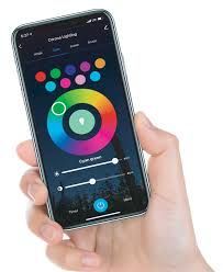 A person is holding a smart phone in their hand.