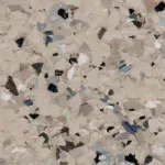 A close up of a tile floor with a lot of small rocks on it.