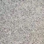 A close up of a gray granite counter top.