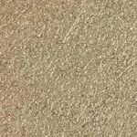 A close up of a beige carpet texture.