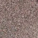A close up of a brown carpet texture.