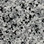 A close up of a gray and black granite floor.