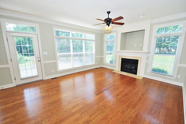 Cozy living room with hardwood flooring and improved interior design details.