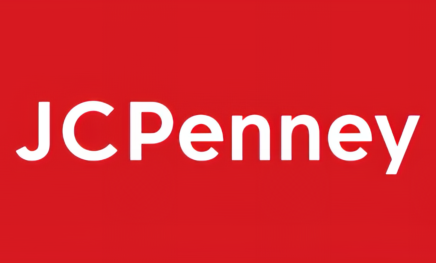 A red background with the word jcpenney in white letters