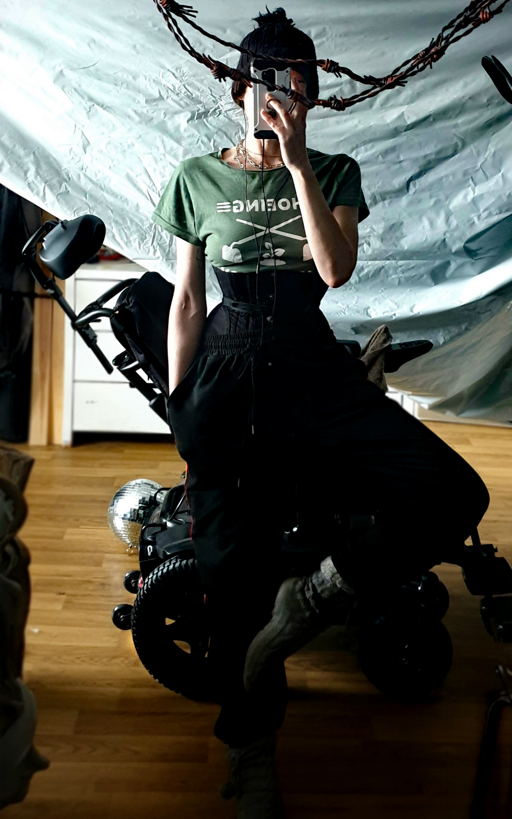 Me standing next to my electric wheelchair.
