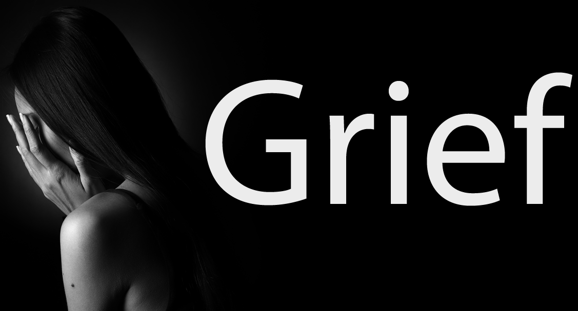Black and white image of a woman covering her face on a black background with the word 'Grief', in white, next to it.