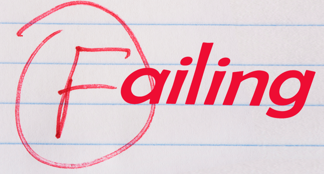 A red 'F' written on lined paper, with 'ailing' typed next to it, spelling 'Failing'.