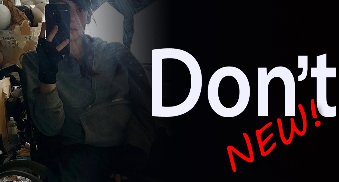 A woman in a wheelchair talking a selfie with the 'Don't' in white on a black background.