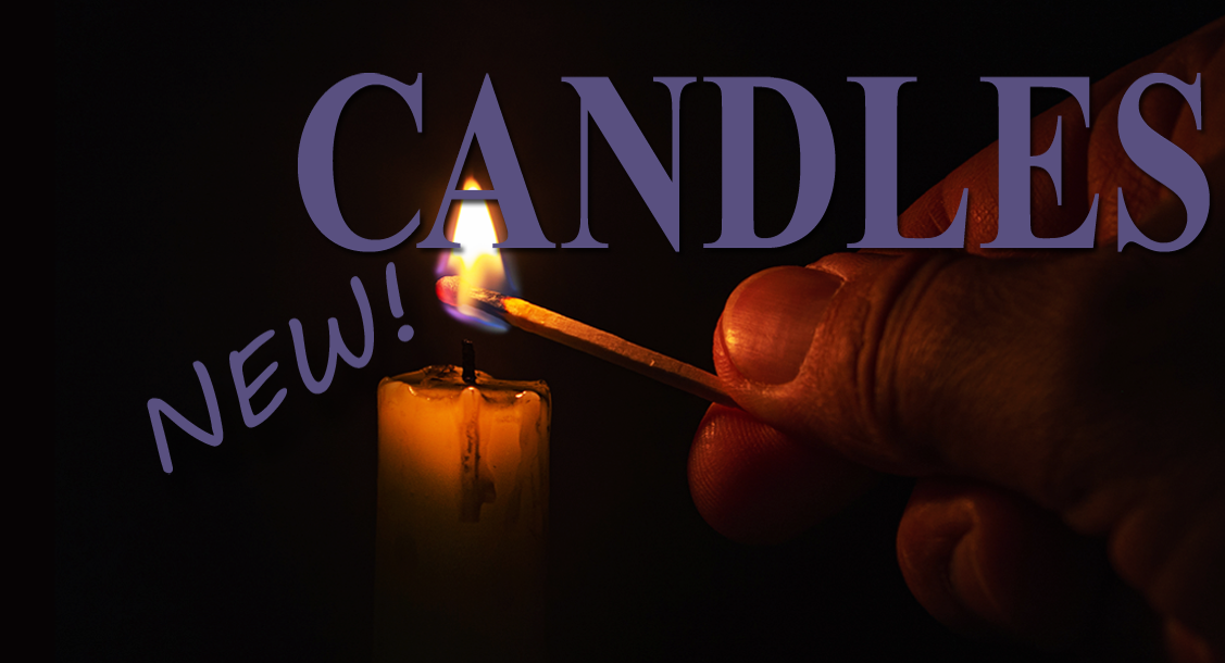 A man's hand lighting a candle with a match and 'Candles' written across it.