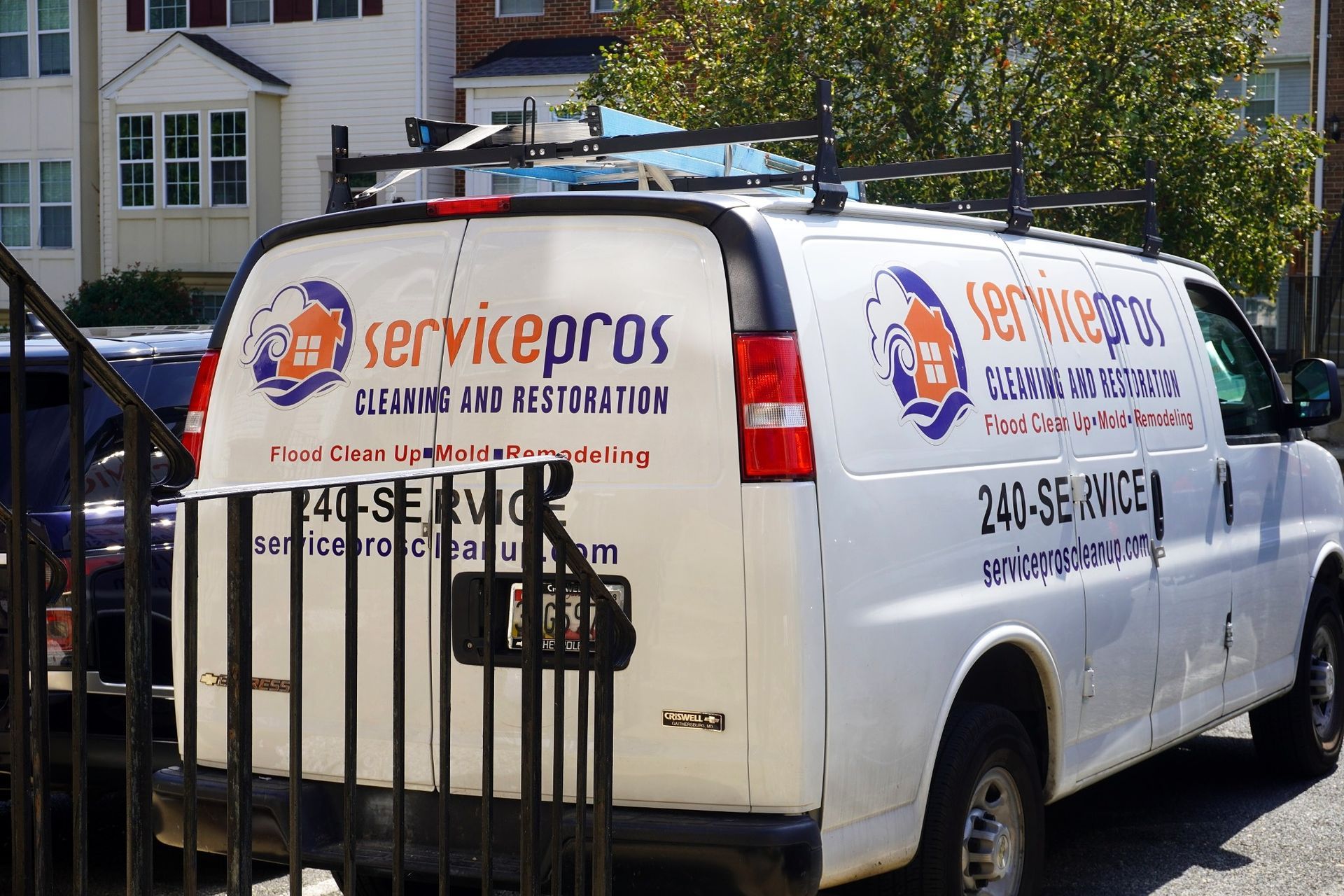 Service Pros restoration technician evaluating property damage during an emergency assessment