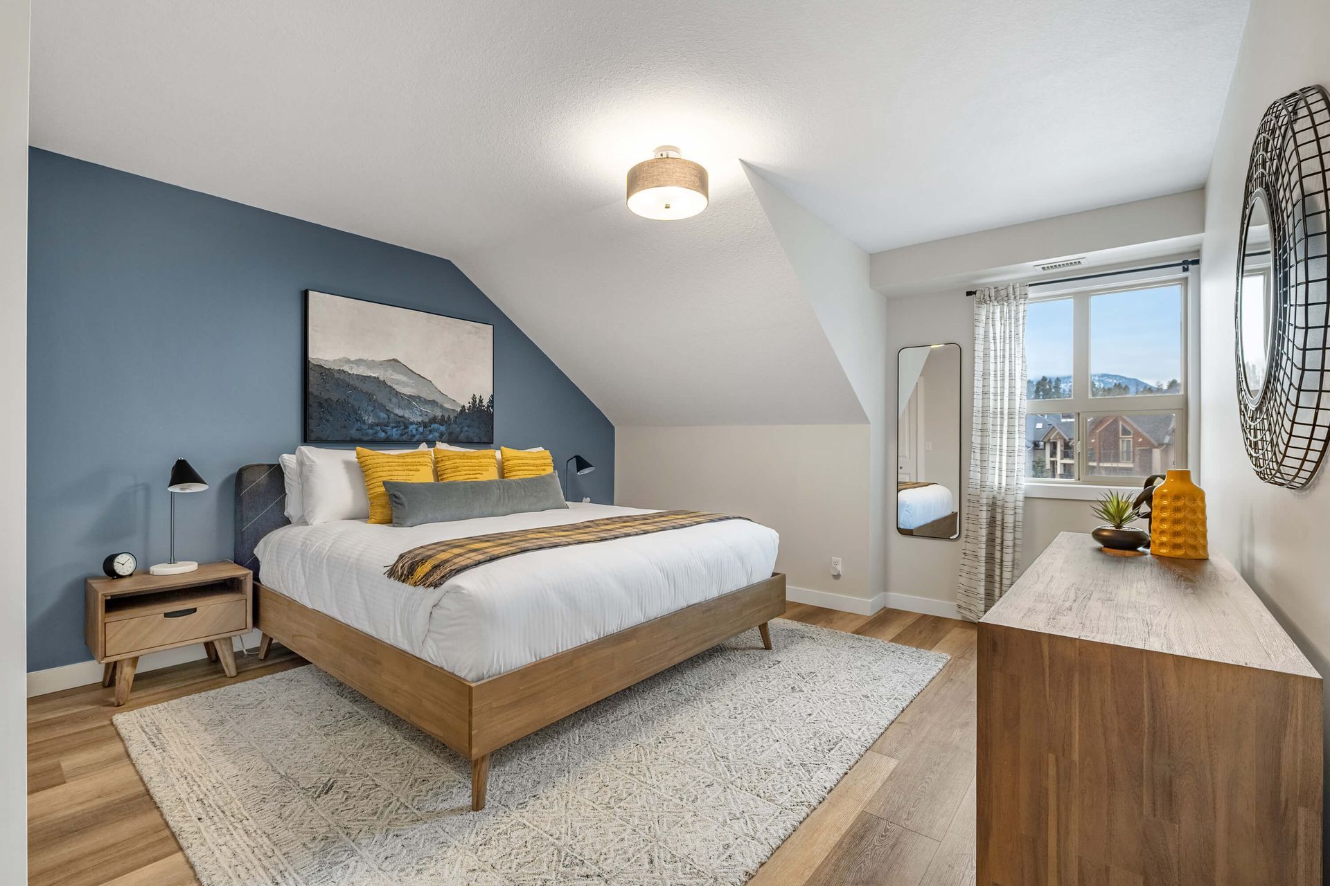 Primary bedroom of high noon, a Lake Windermere Pointe BC Vacation Rental hosted by Aisling Baile Property Management.