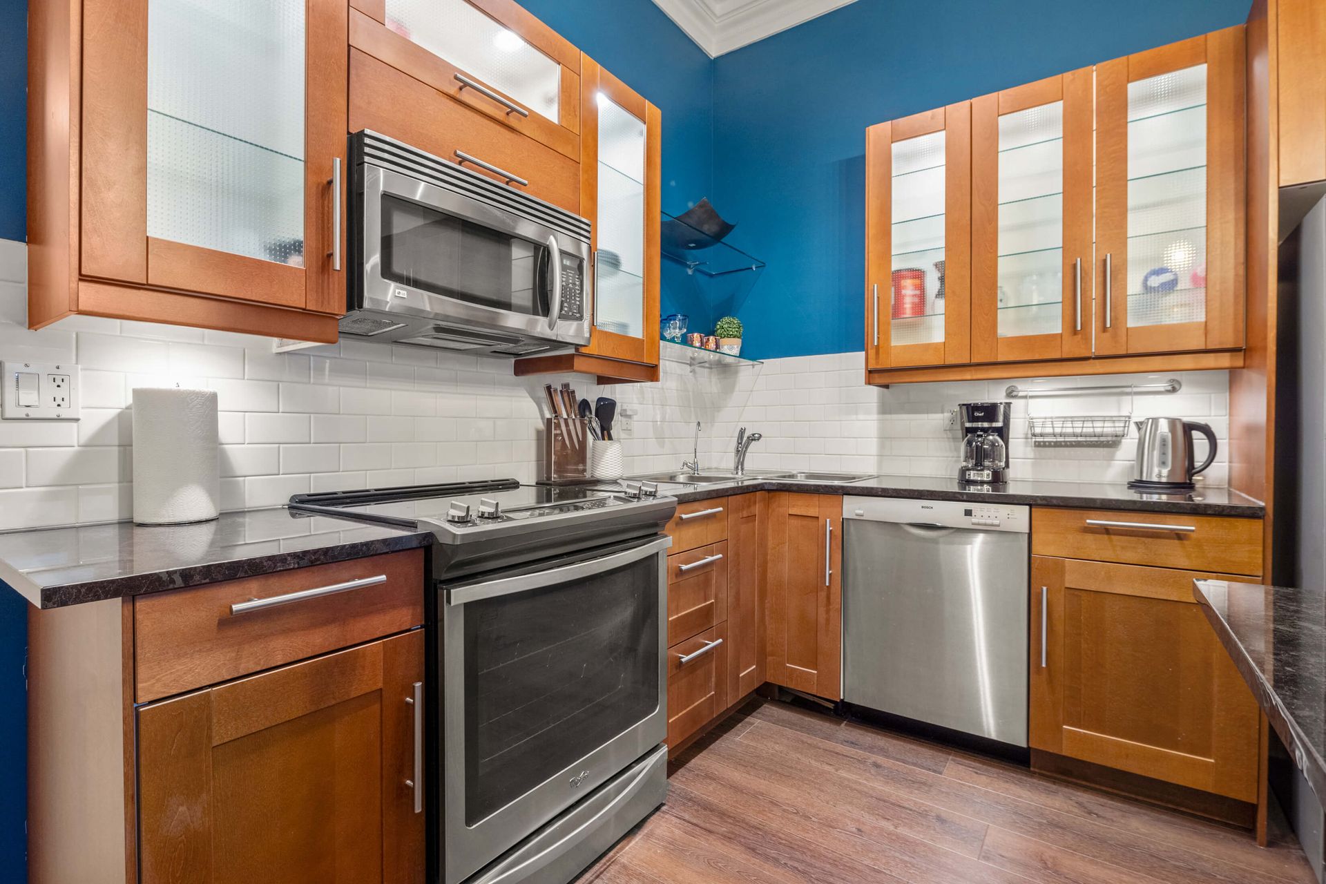 Full kitchen of the Red Brick Loft, a Calgary short-term rental hosted by Aisling Baile Property Management.