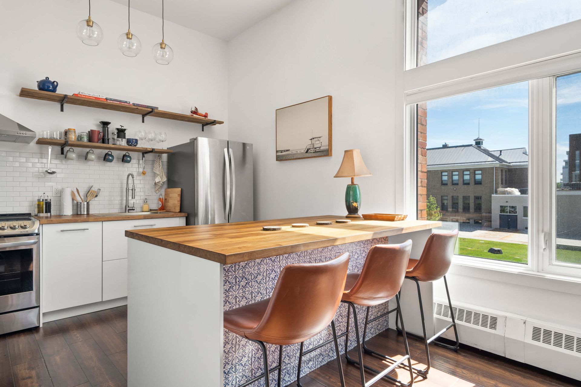 Full kitchen of the McGill Loft, a Calgary short-term rental hosted by Aisling Baile Property Management.