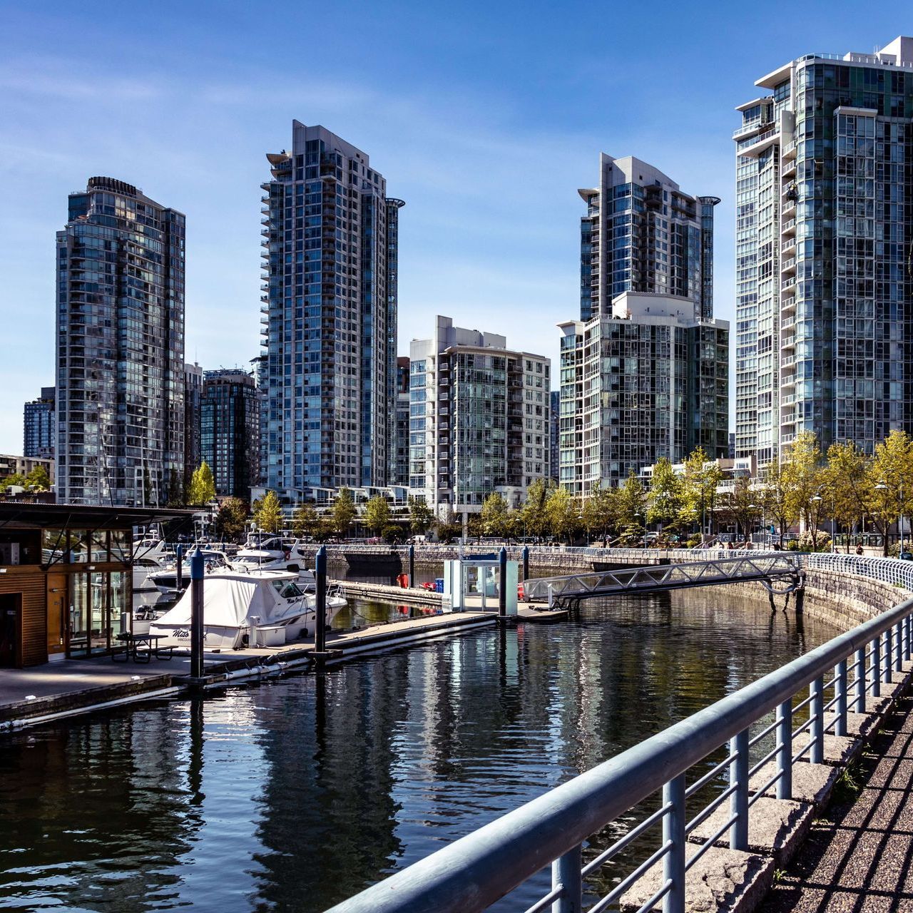 A large body of water surrounded by tall buildings