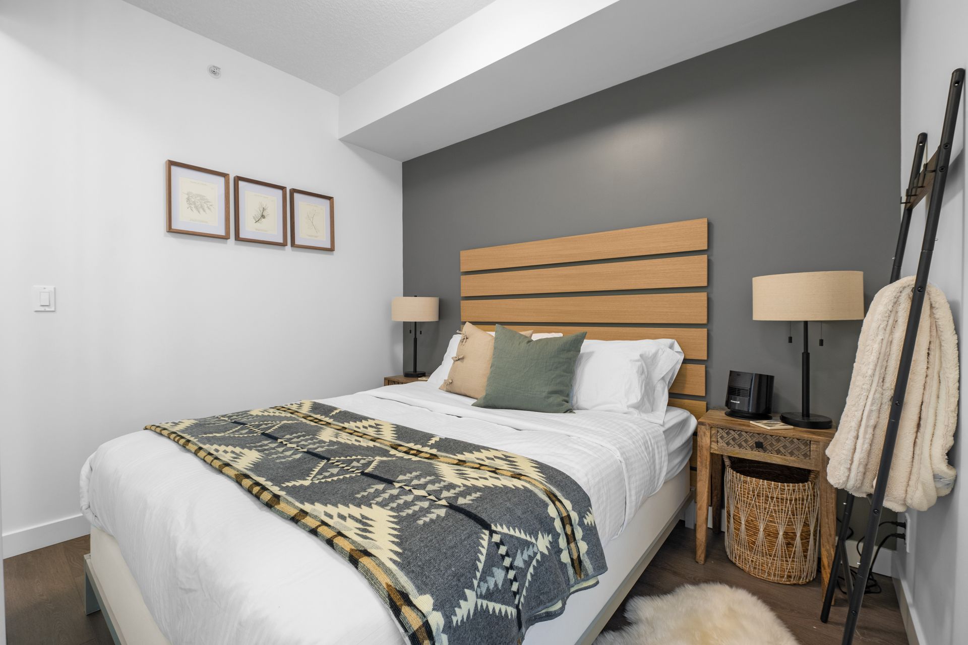 Primary bedroom of Mr & Mrs. Smith, a Calgary short-term rental hosted by Aisling Baile Property Management.