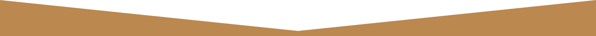 A white triangle is on a brown background.