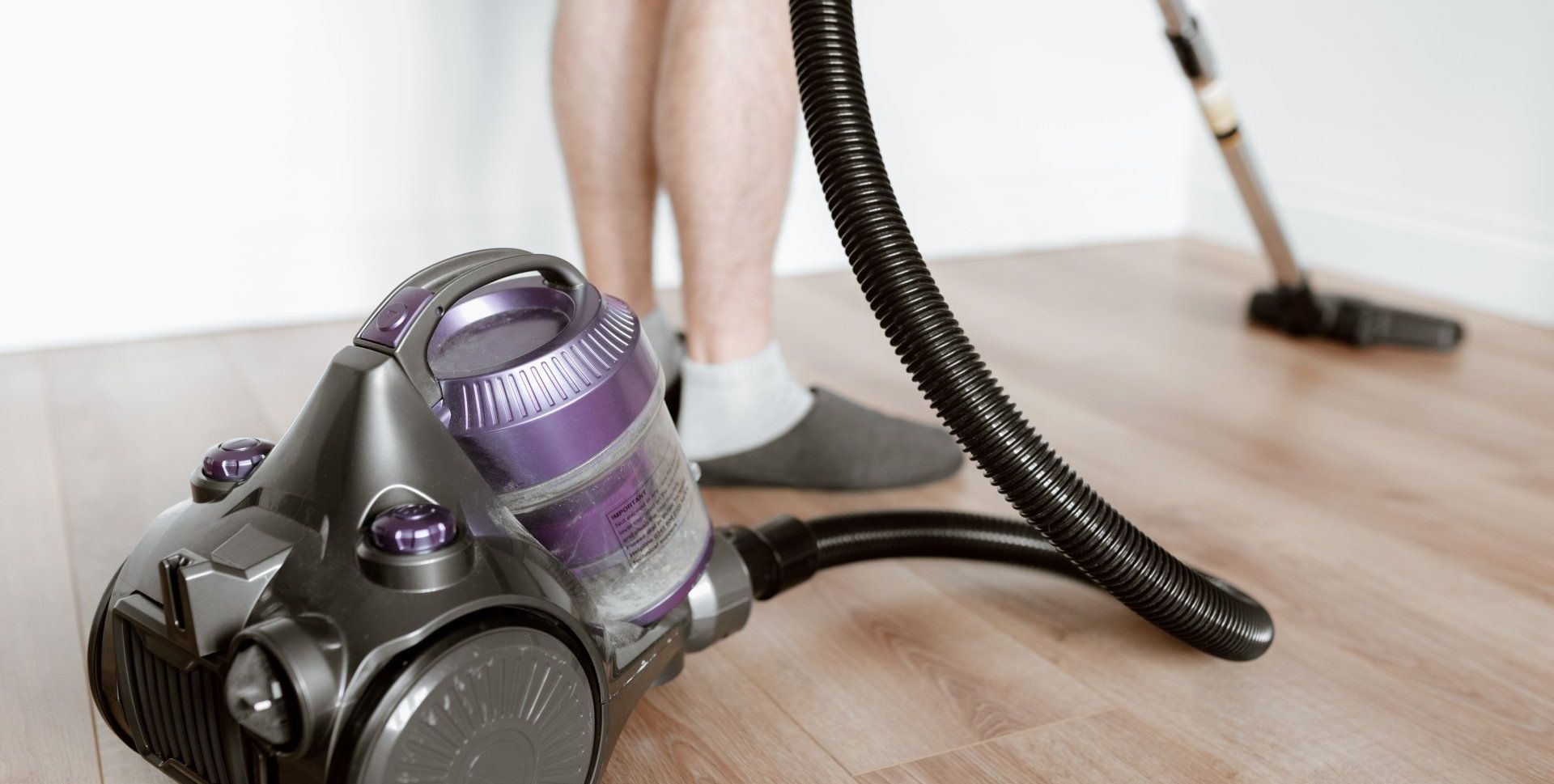 vacumming hardwood floor