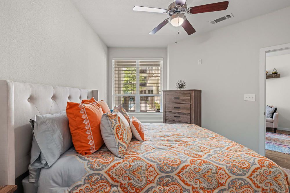 Spacious Bedroom with Ceiling Fan at The Marq at West 7th