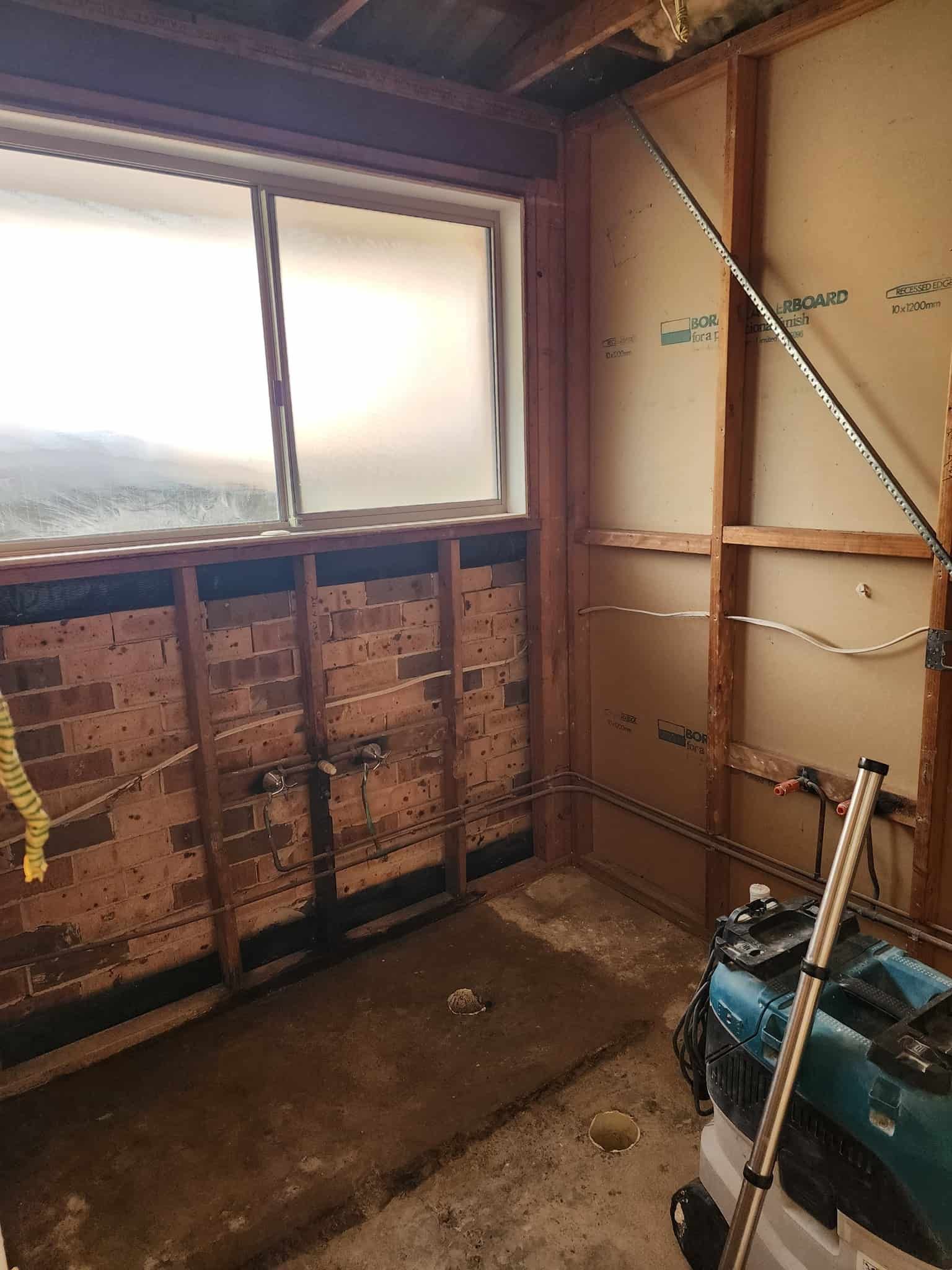 A Room With A Window And A Vacuum Cleaner In It — Renovate A Space In Empire Bay, NSW