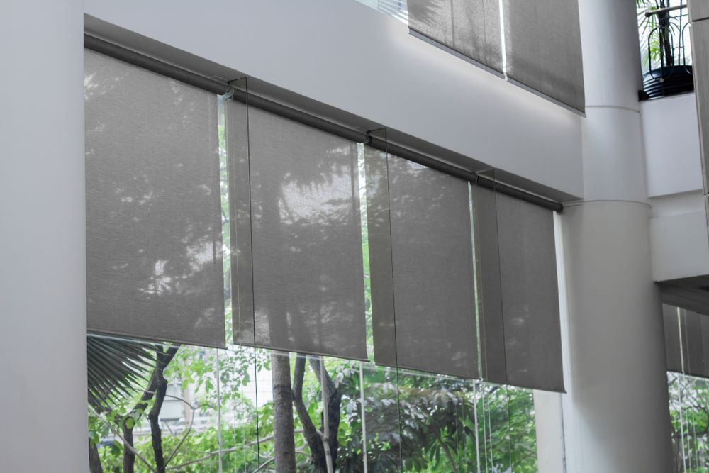 A Large Window With Four Blinds On It — Maxview Blinds and Shutters in Maitland, NSW
