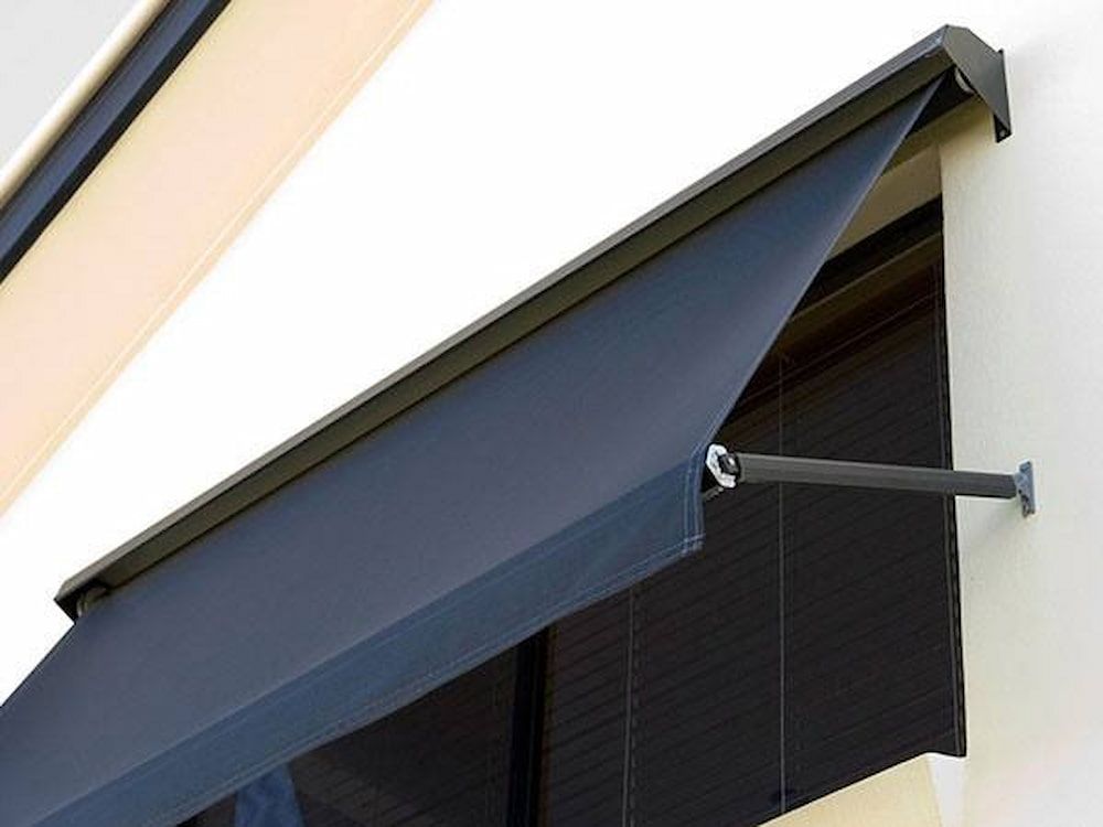 A Covered Patio With Gray Ziptrak Blinds — Maxview Blinds and Shutters in Beresfield, NSW