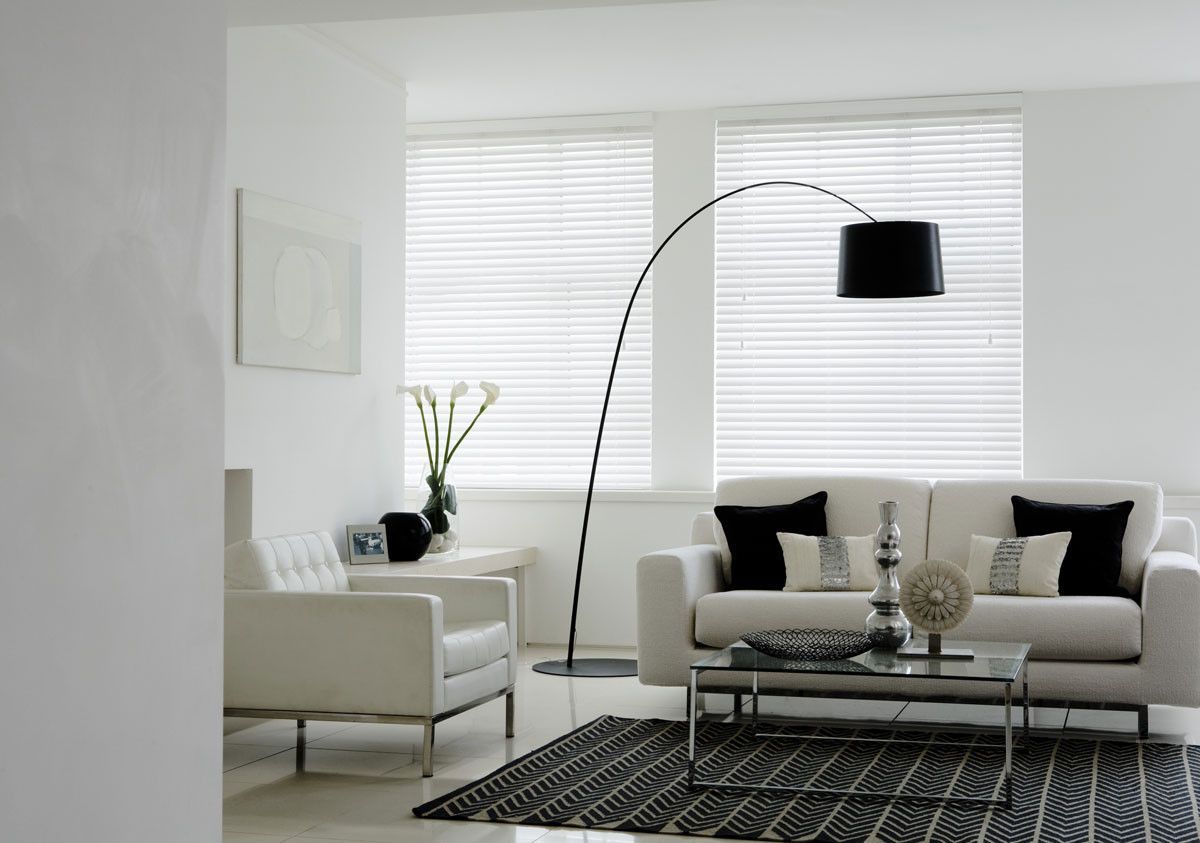 A Room With A Desk And Chair And Shutters On The Windows — Maxview Blinds and Shutters in Beresfield, NSW