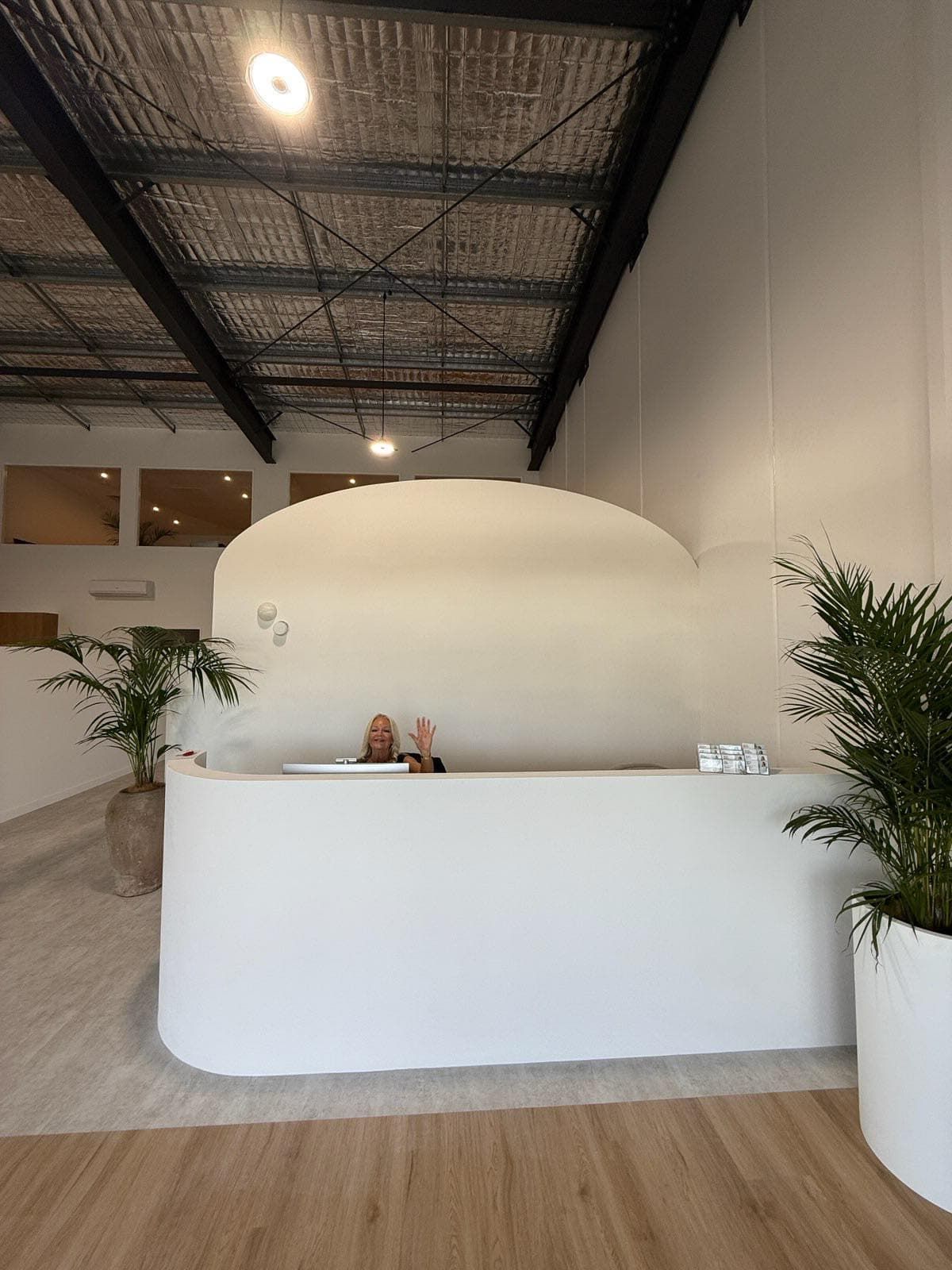 Minimalist Reception Desk in a Bright, Modern Lobby — Tyrone Building Solutions in Anna Bay, NSW