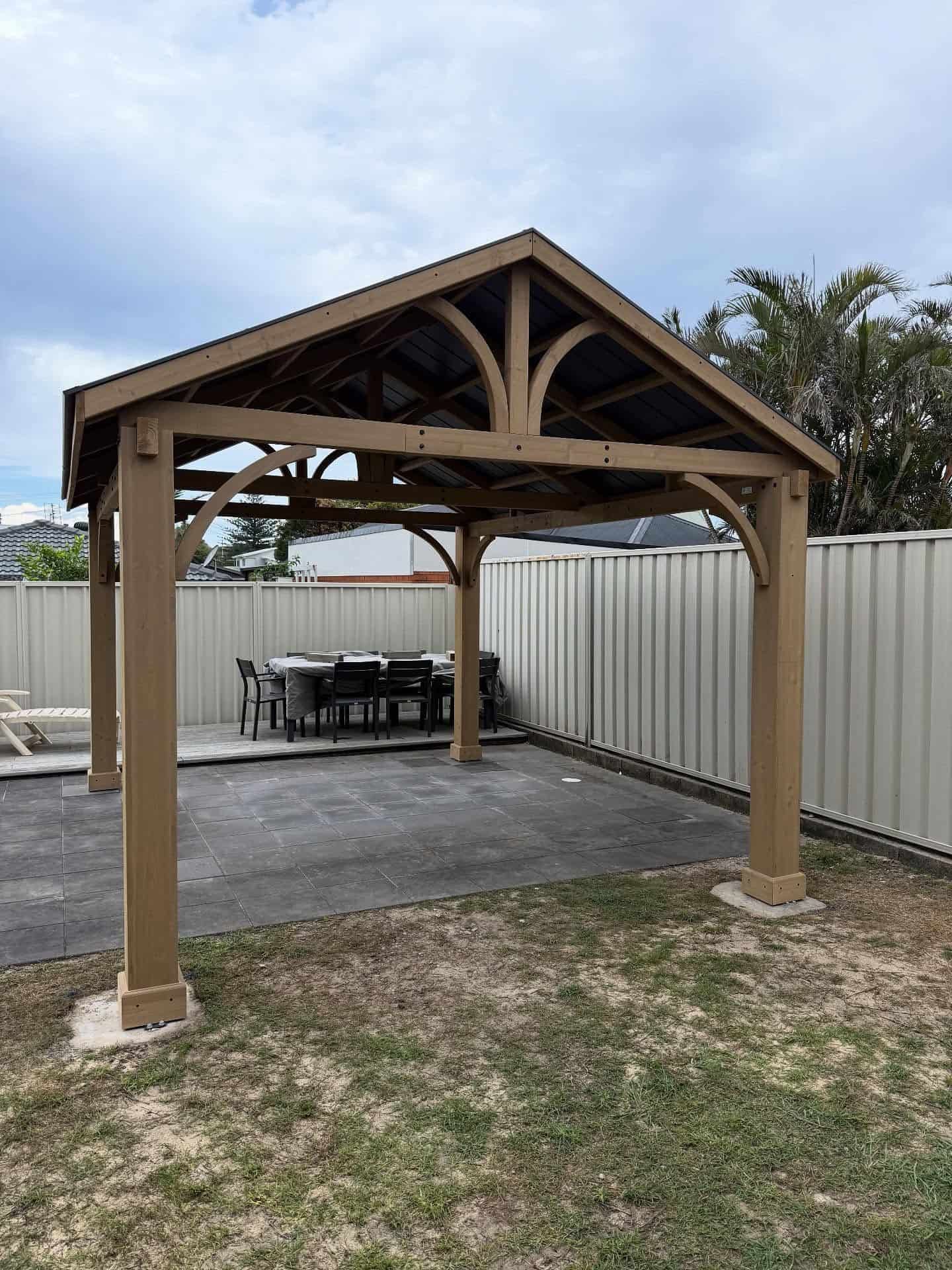 Wooden Backyard Gazebo With a Picnic Table — Tyrone Building Solutions in Anna Bay, NSW