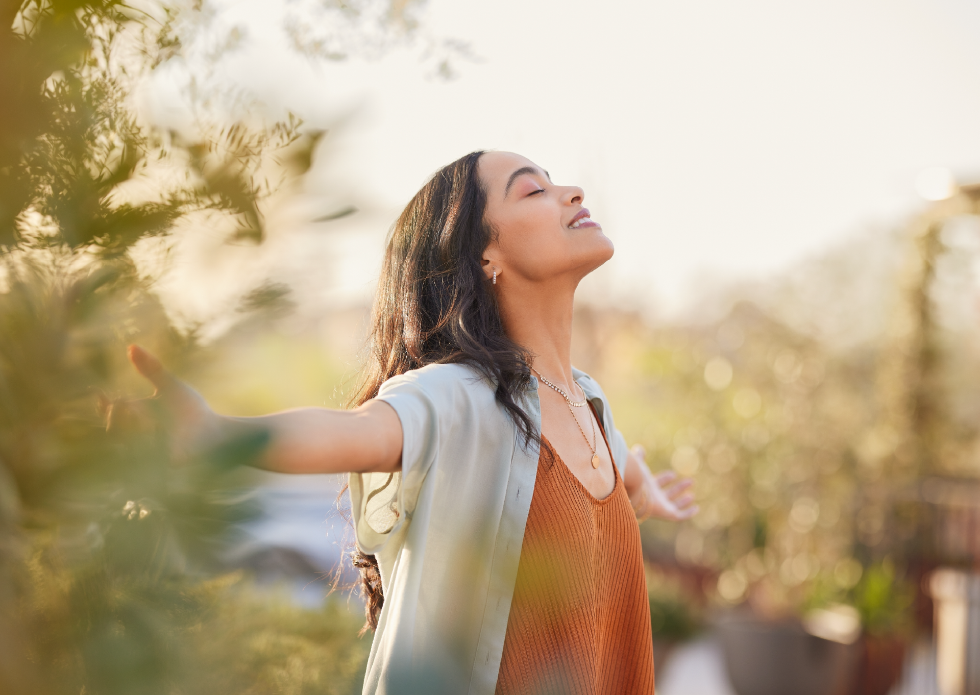 woman with arms wide open