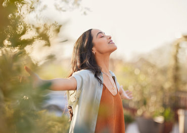 woman with arms wide open