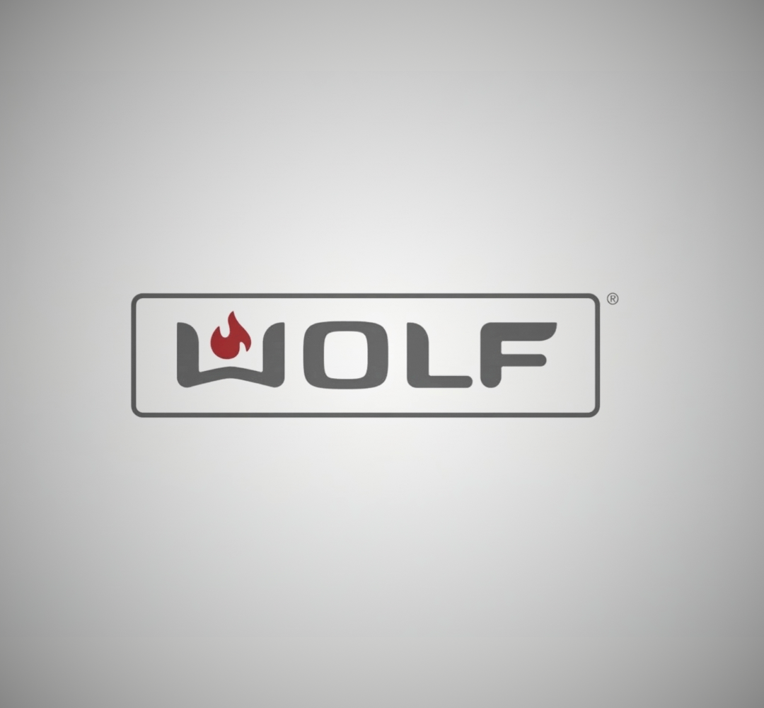 The Wolf logo featuring a gray, stylized wordmark with a red flame icon above the letter W inside a gray rectangle.
