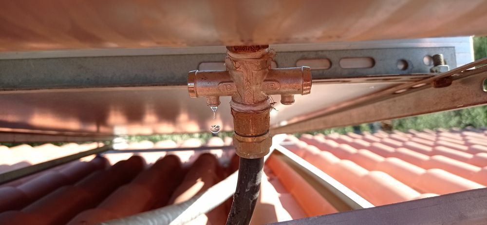 Close-up of a Rooftop Pipe Valve — One Flush Plumbing Service In Pacific Pines, QLD