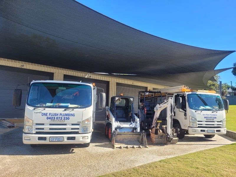 One Flush Plumbing Truck & Bobcat — One Flush Plumbing Service In Oxenford, QLD