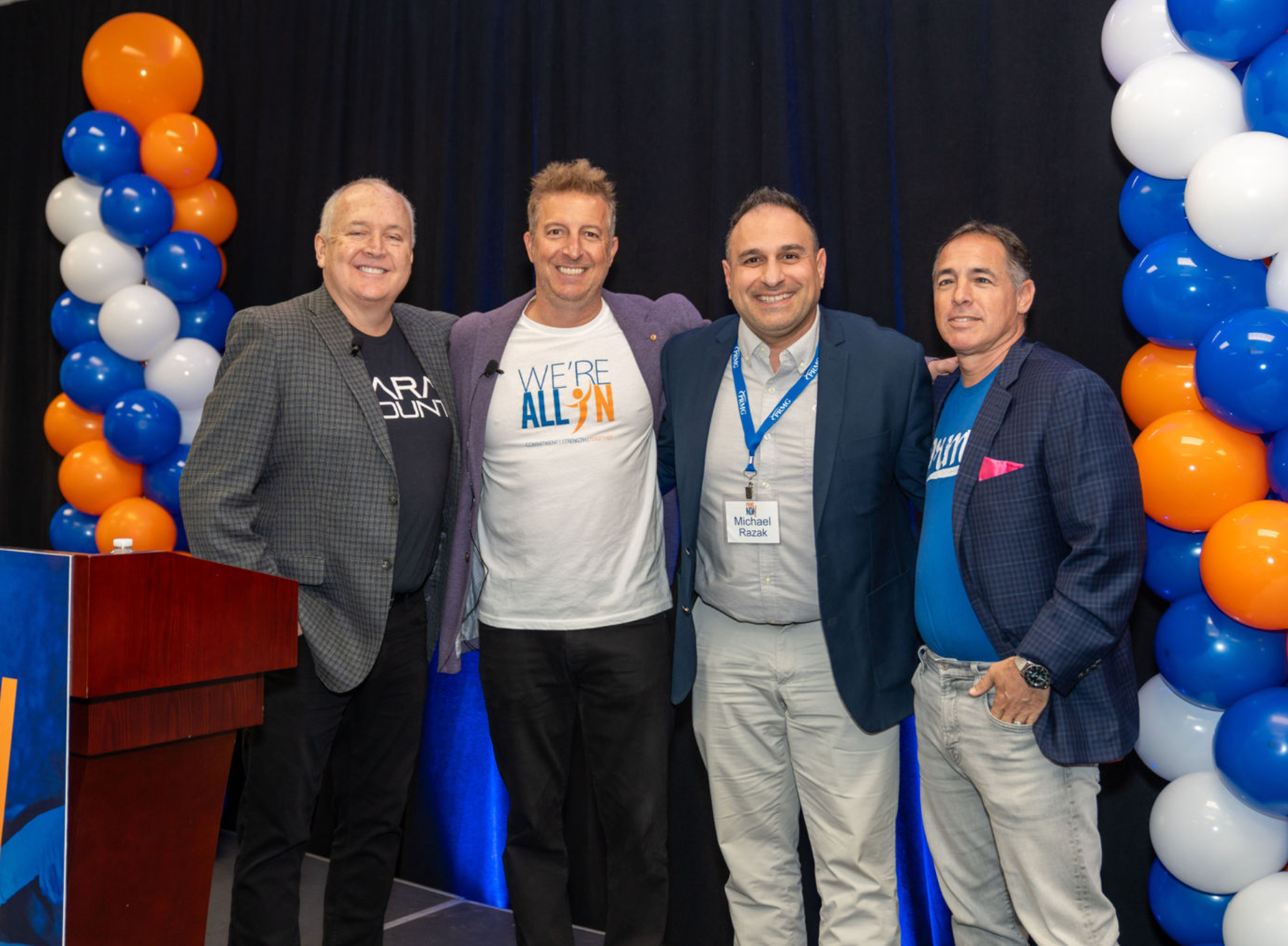 PRMG leadership at the We're All In company event