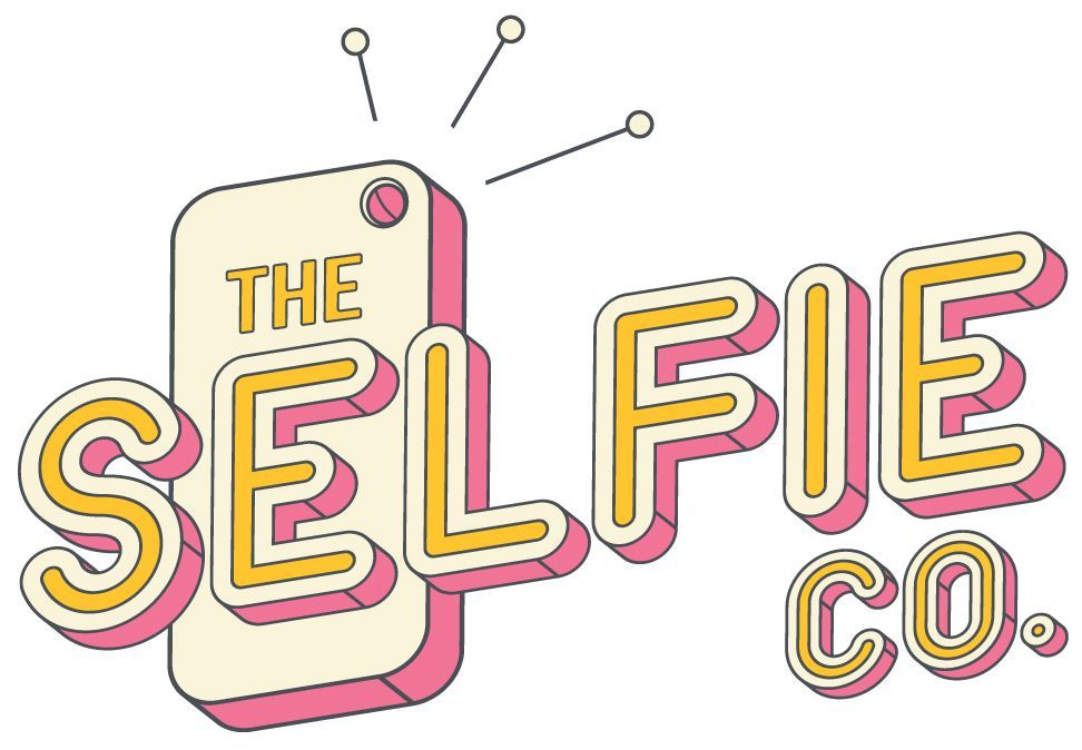 The logo for the selfie co. shows a cell phone with a tag on it.