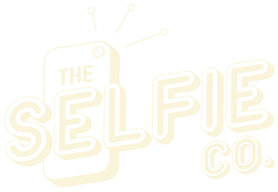 The logo for the selfie co. shows a cell phone with a tag on it.