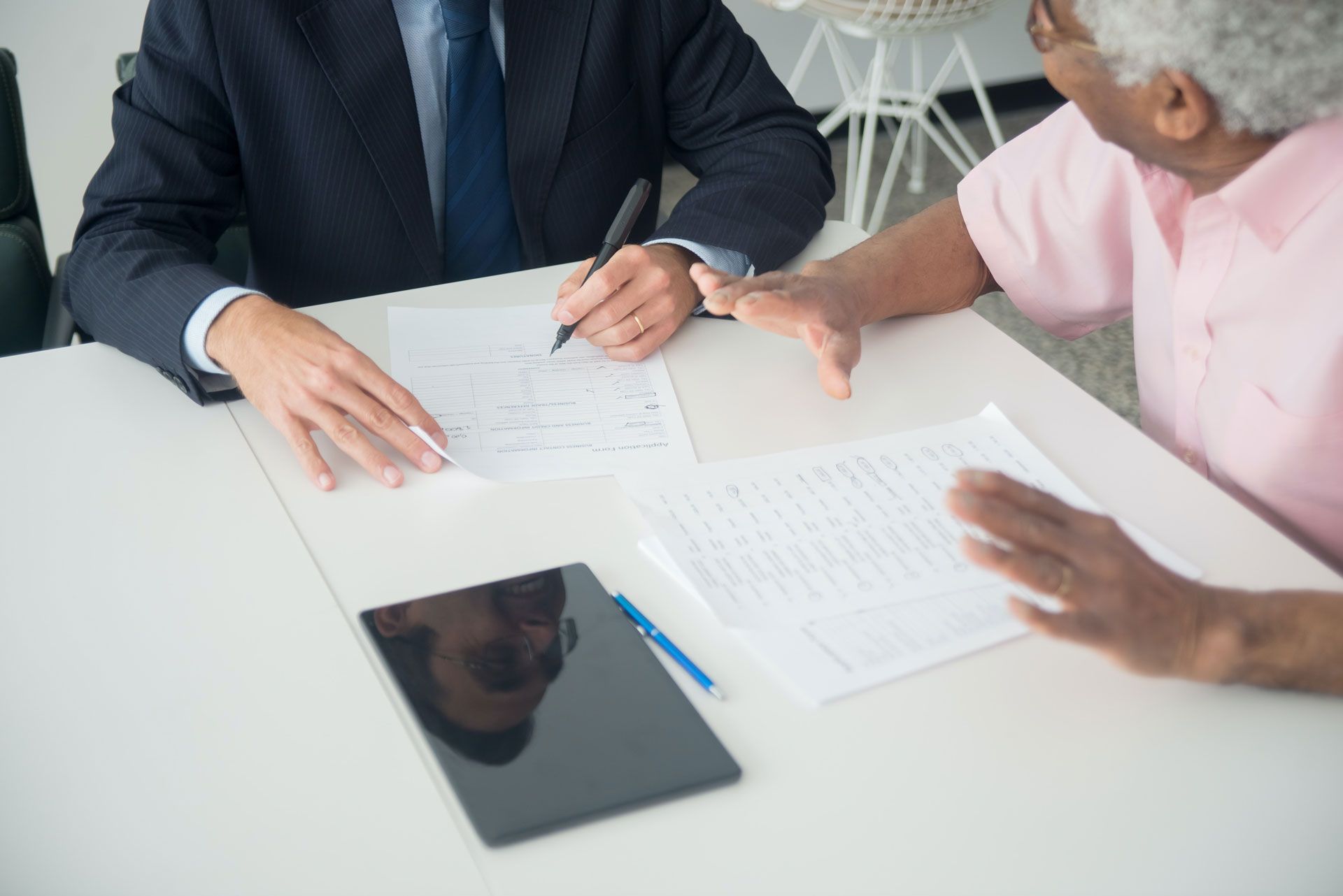 An-Elderly-Man-Consulting-an-Insurance-Agent