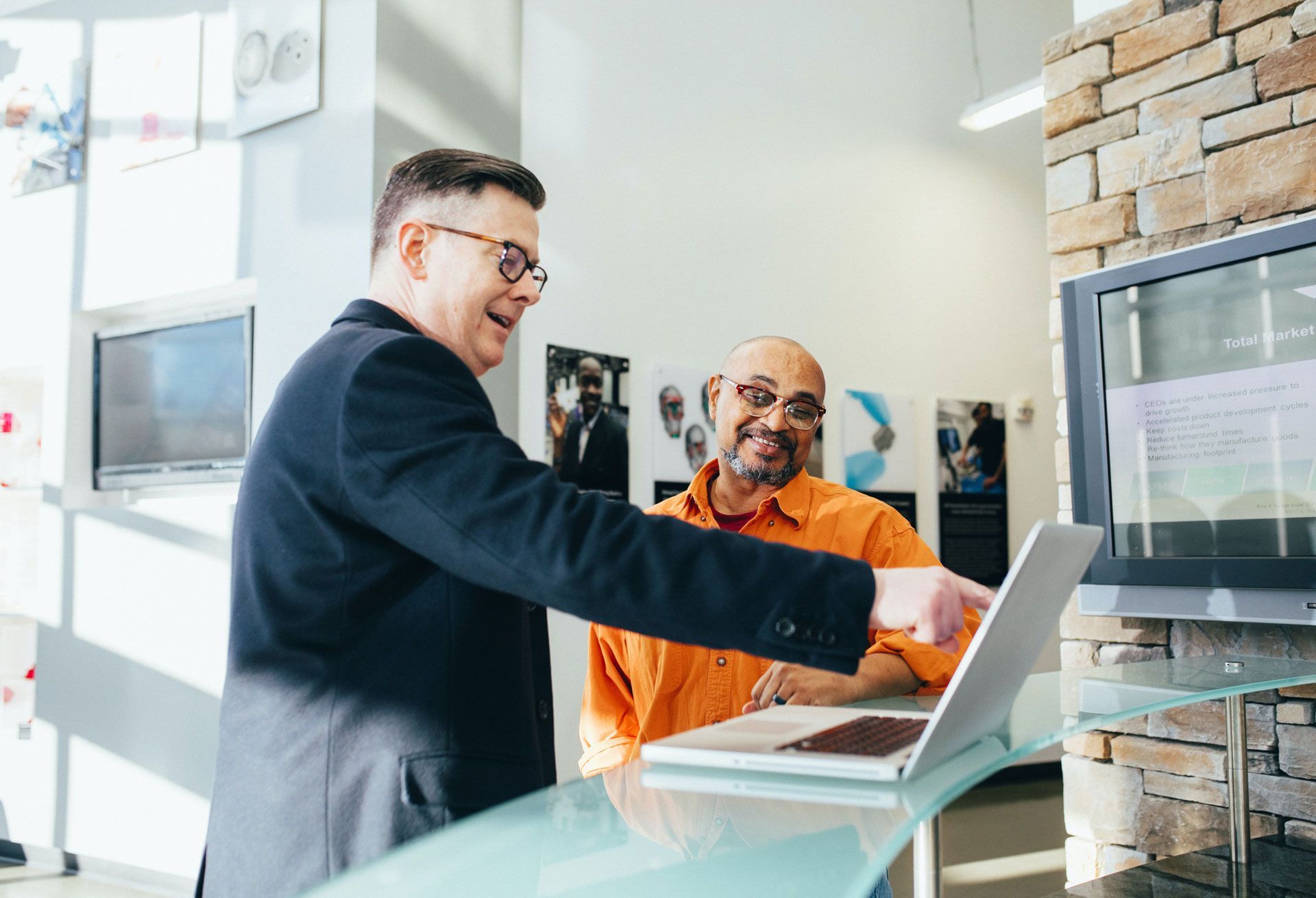 Man-Pointing-Laptop-Computer