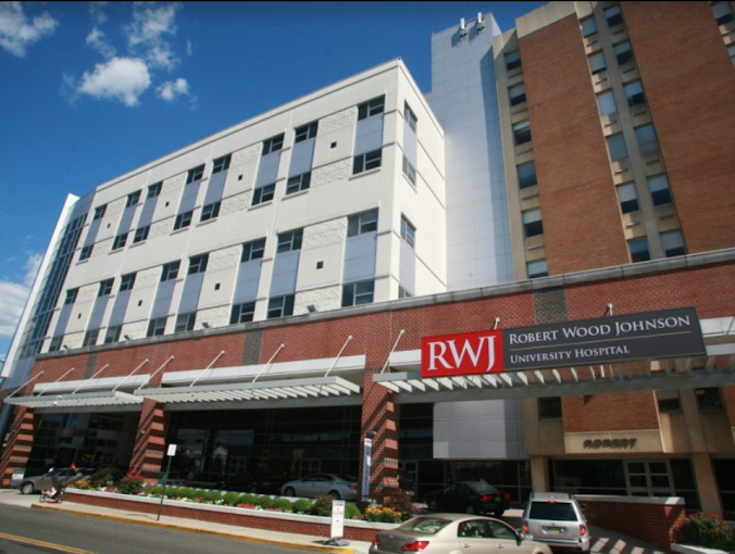 A large building with rwj written on it