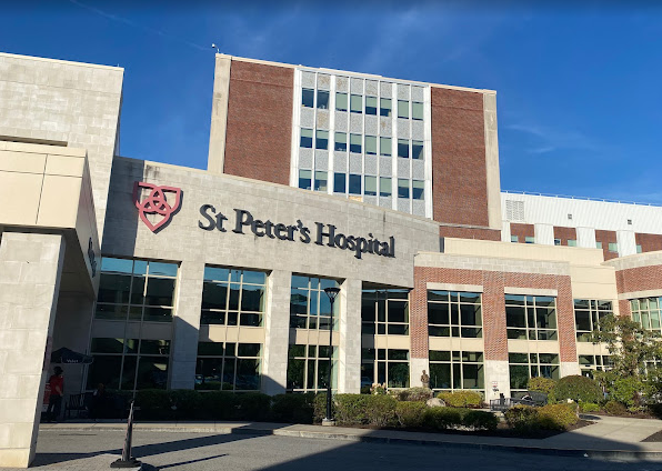 A large building with a sign that says st peter 's hospital
