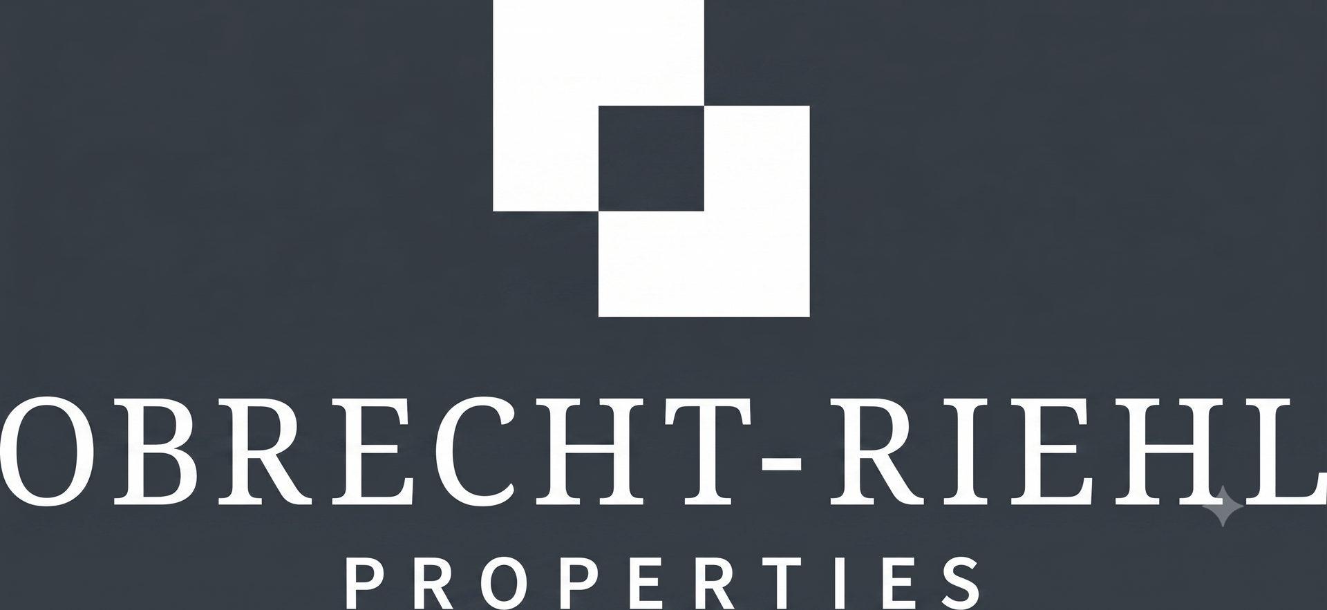 Obrecht-Riehl Properties logo in white on a dark background with a geometric icon