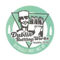 Dublin Bottling Works logo with smiling man, soda bottle, and green circular badge reading “Historically Sweet Since 1891.”