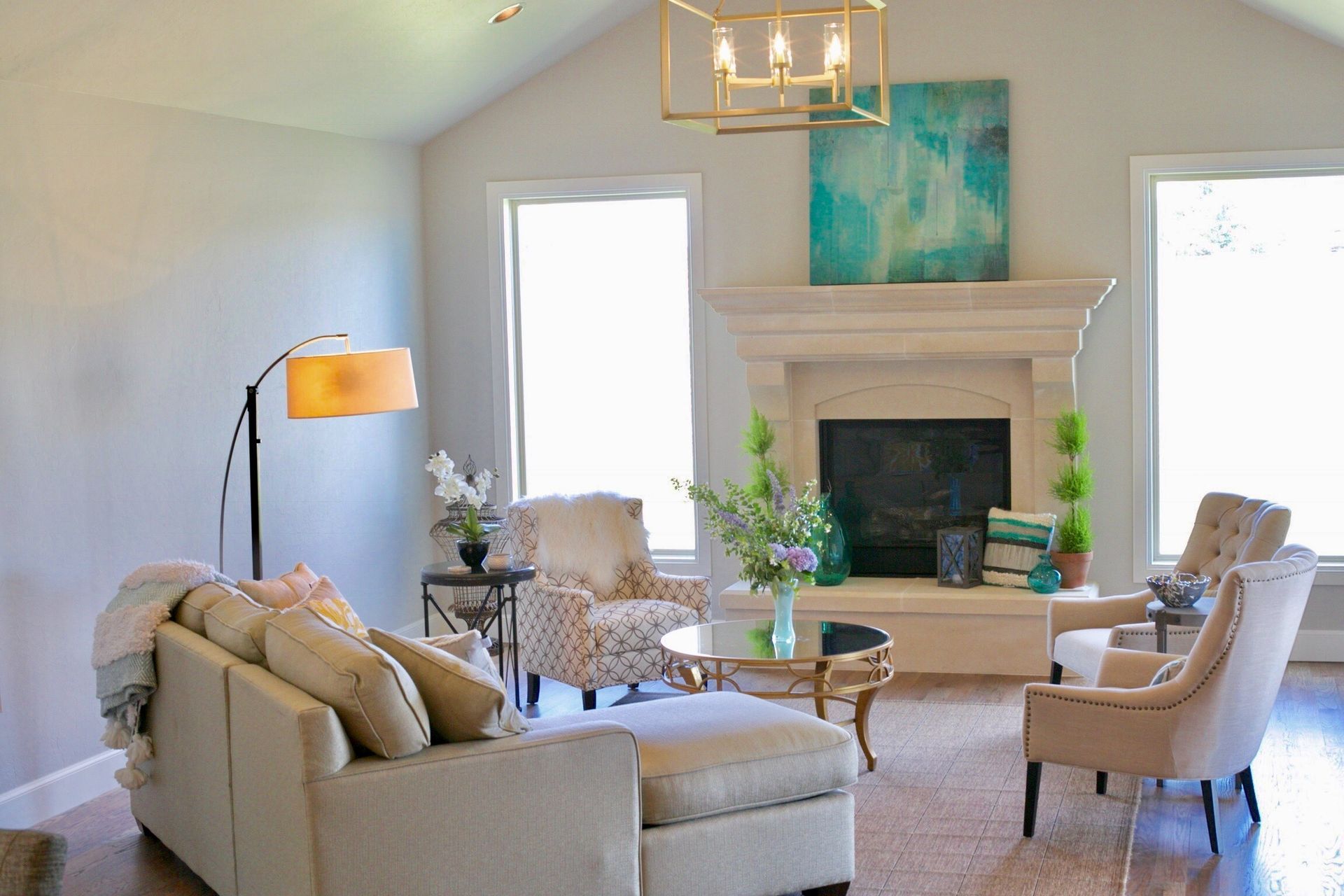 A living room with a blue couch and a yellow chair