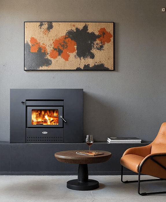 Modern Living Room With a Lit Black Fireplace — Complete Heating In Huntingfield, TAS