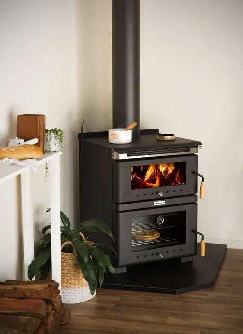 A Black Wood-burning Stove With a Glass-fronted Firebox and Oven — Complete Heating In Huntingfield, TAS